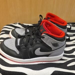 Nike Kids Black and Gray Sneakers with Red Trim